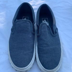 Vans gray slip ons.